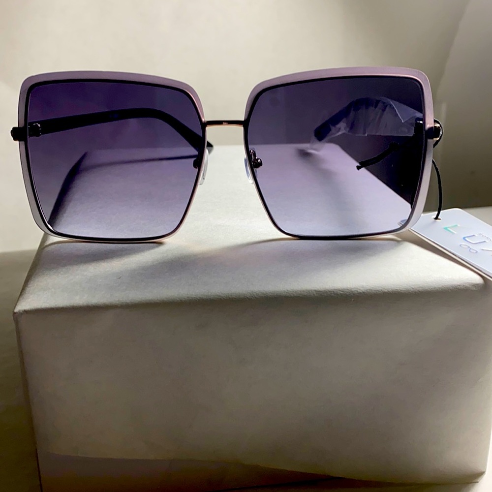 Gray with a hint of Lavender Sunglasses by Luxe.